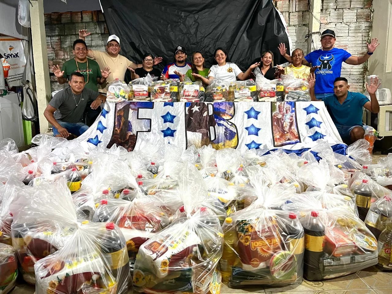 Amigos da FBI entregam cestas básicas para famílias carentes durante festejos em honra a Nossa Senhora do Carmo